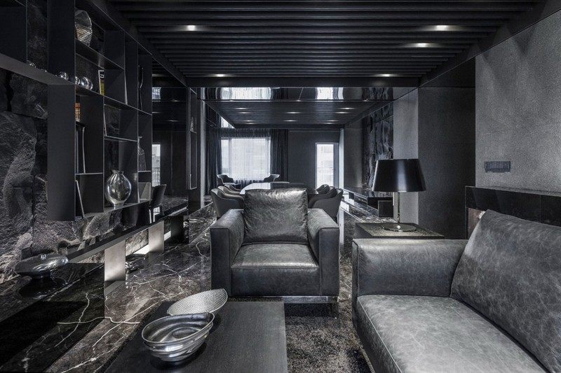 carrelage-sol-marbre-salon-marbre-noir-canapé-fauteuil-gris-meuble-rangement-mural