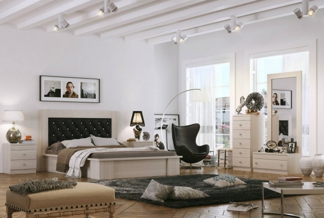 chambre-adulte-design-blanche-tête-lit-capitonnée-tapis-gris-foncé-armoires-blanches