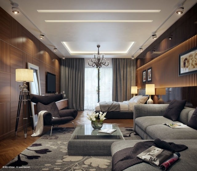 chambre-adulte-design-canapé-gris-clair-tapis-gris-motifs-fauteuil-noir-lampadaire-tripode
