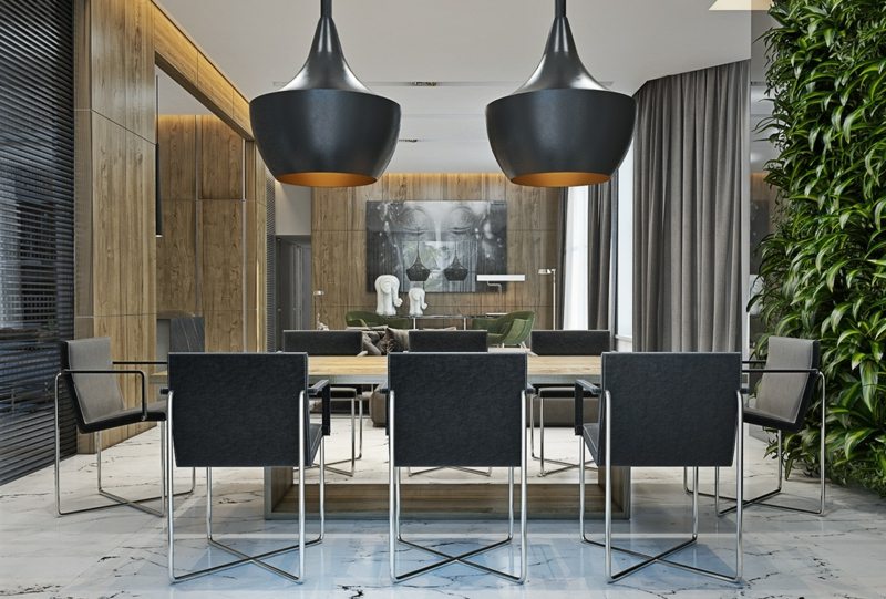interieur-minimaliste-salle-manger-plancher-marbe-suspensions-noir-mat-mur-végétalisé
