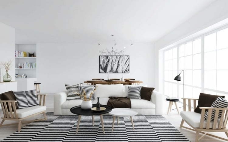 intérieur-scandinave-salon-blanc-coussins-tapis-rayures-bancs-bois-noir-blanc intérieur scandinave