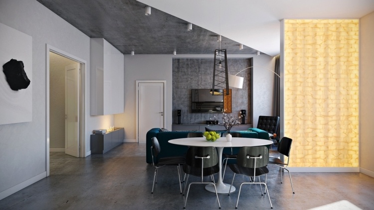mobilier-industriel-salle-séjour-mur-plafond-béton-table-tulipe-chaises-noires