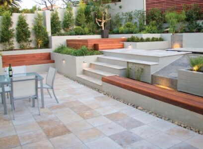 revêtement-sol-pierre-naturelle-travertin-banc-bois-coin-repas-terrasse-exterieure