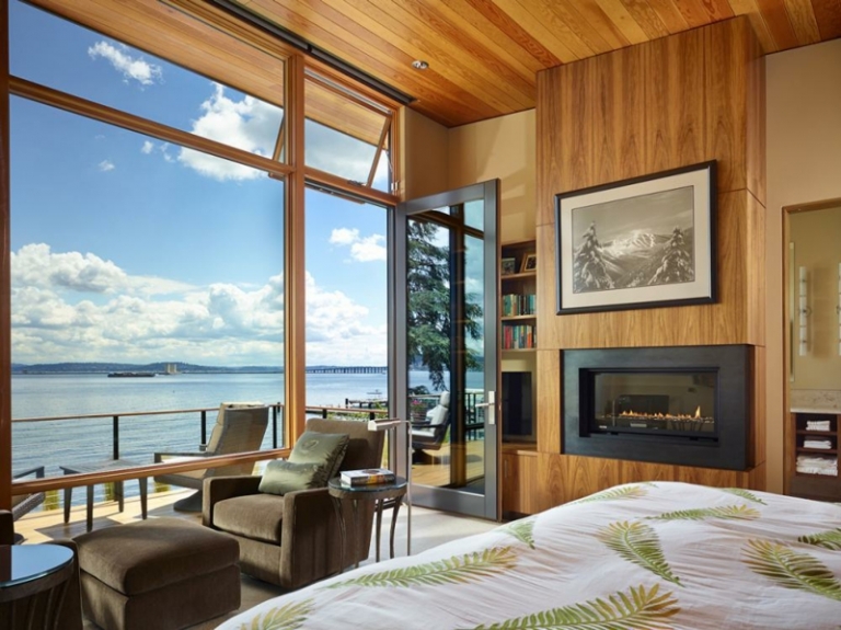 tendances-design-interieur-cheminée-mur-fenêtre-panoramique-chambre-coucher-balcon design d’intérieur