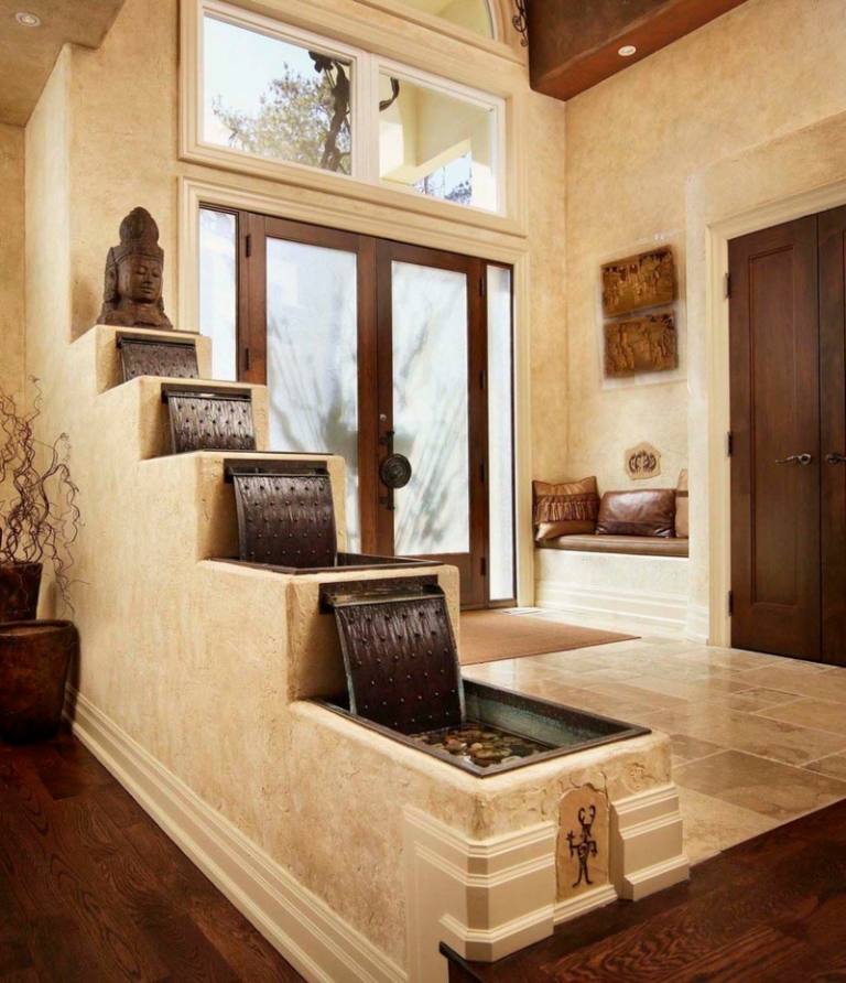 tendances-design-interieur-fontaine-cascade-entrée-coin-assise design d’intérieur