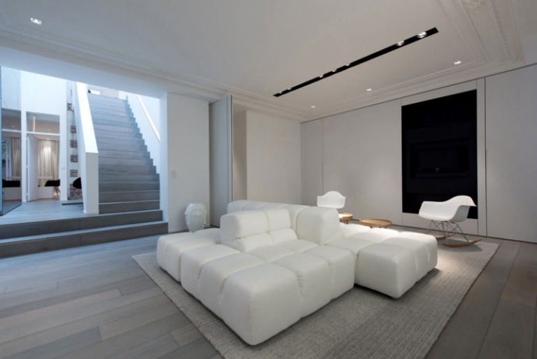 amenagement-interieur-appartement-noir-blanc-canape-modulable