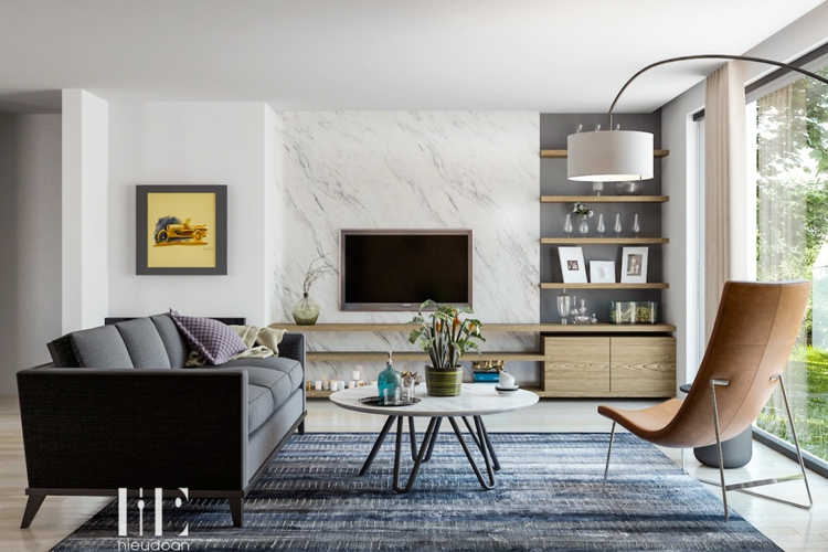 amenagement-salon-moderne-mur-marbre-canapé-tapis-gris-chaise-cuir-marron
