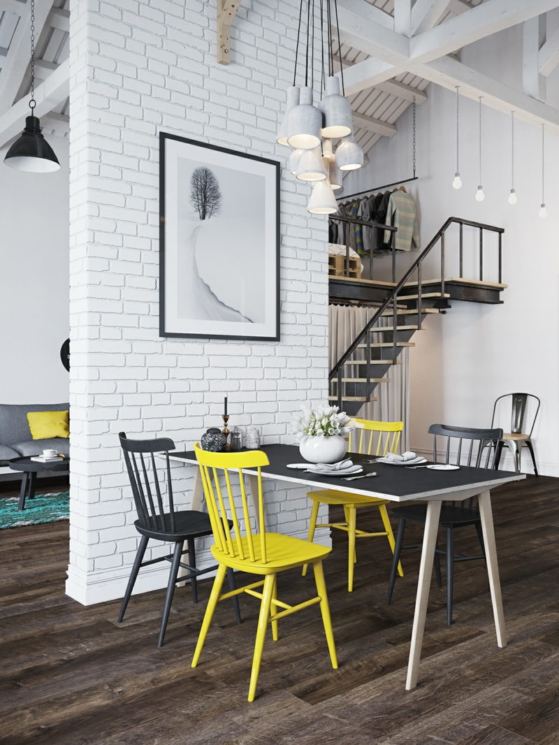 amenagement-studio-style-scandinave-salle-manger-éclectiue-mur-brique-blanche-chaises-jaune-noir aménagement studio