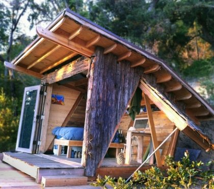 cabane-jardin-moderne-bois-massif-écorce-coin-couchage