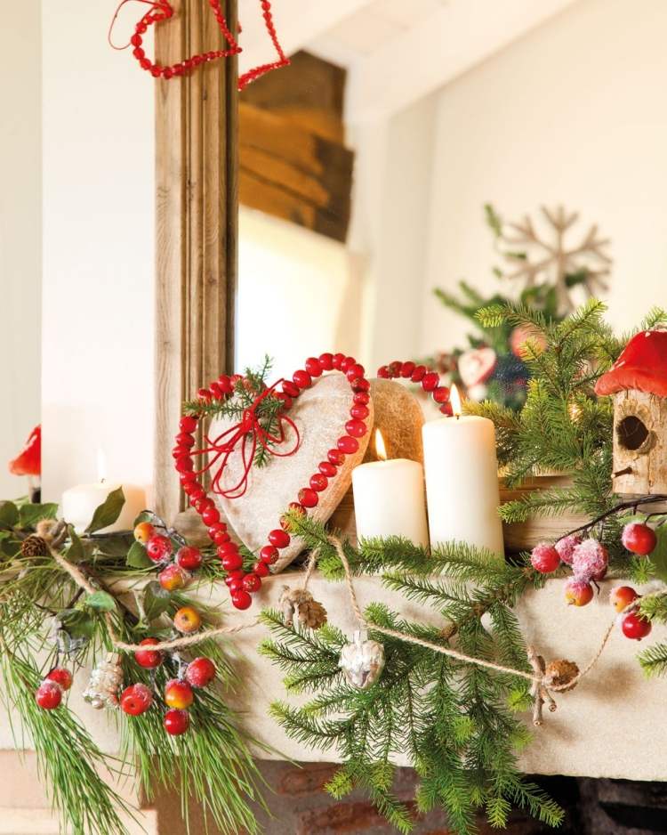 decoration-Noel-interieur-branchettes-sapin-coeur-baies-rouges-bougies-pilier décoration de Noël intérieur