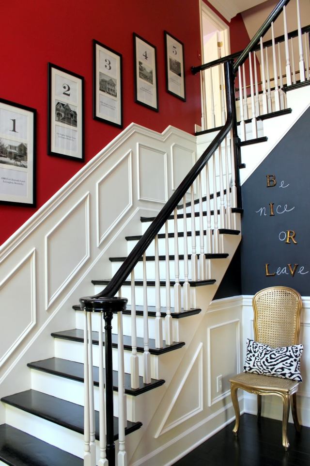 déco-entrée-maison escalier tournant rouge blanc gris cadres