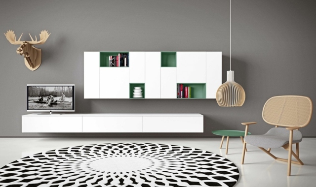 meuble-modulable-salon-blanc-accents-verts-tapis-rond-noir-blanc-suspension-bois