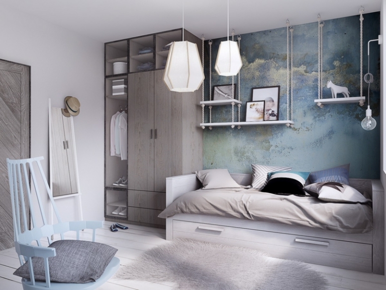 mur-beton-chambre-coucher-étagères-suspendues-armoire-bois-tapis-gris-canapé mur béton