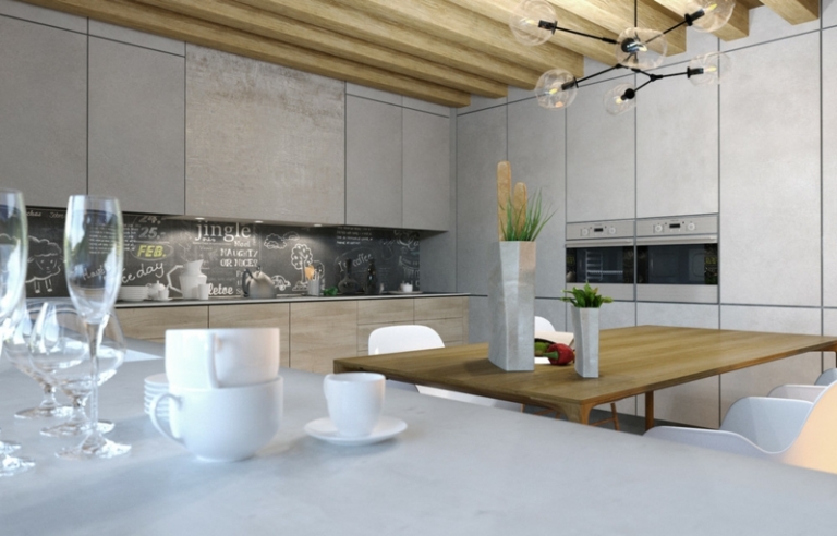 mur-beton-cuisine-coin-repas-armoires-aspect-béton-plafond-poutres-table-manger-bois