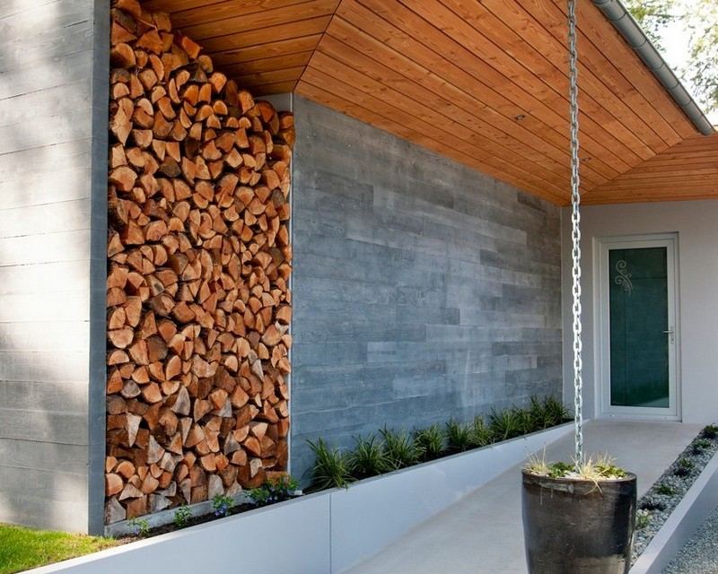 rangement-bois-chauffage-extérieur-niche-murale-plantes-vertes