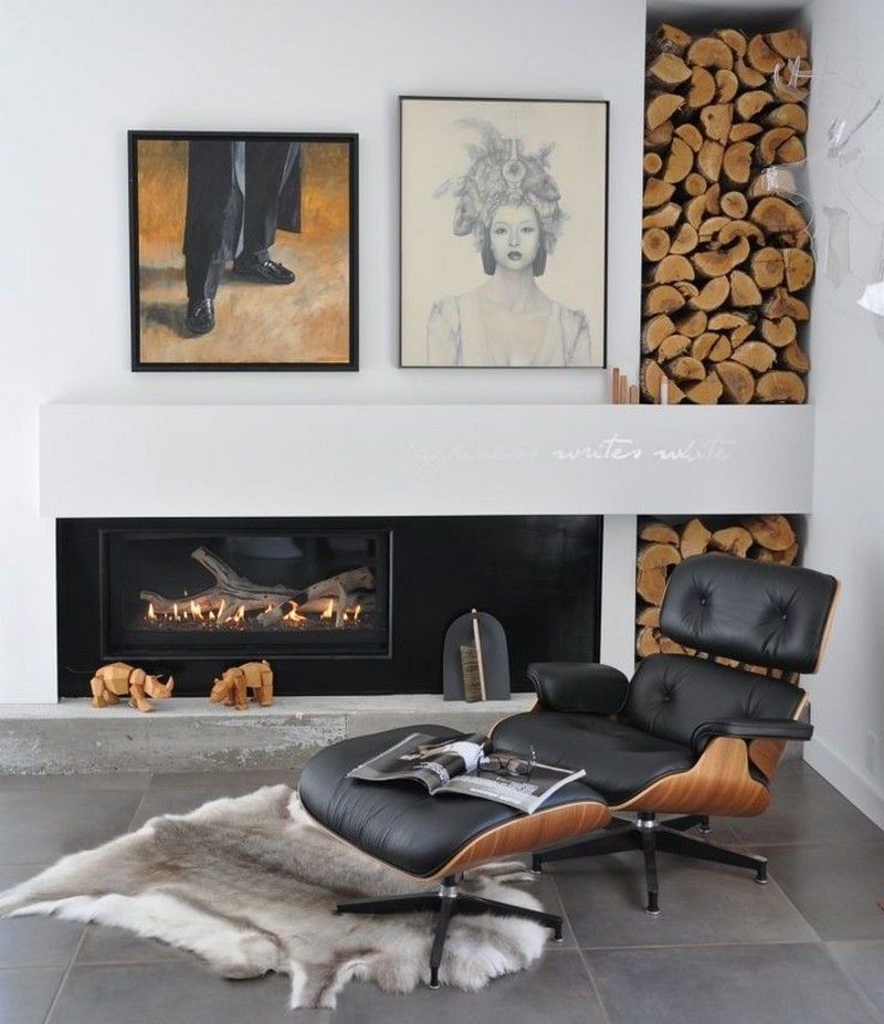 rangement-bois-chauffage-niche-murale-tableaux-fauteuil-relax-tapis-fourrure rangement bois de chauffage