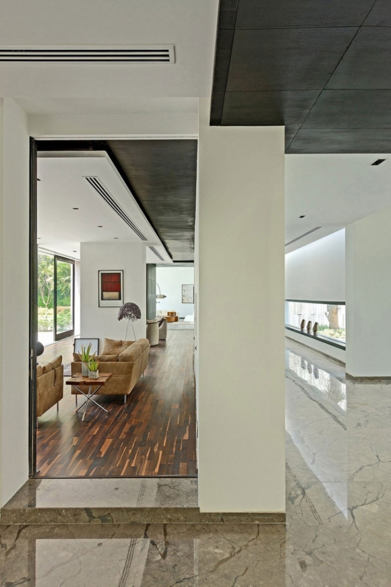 revêtement sol salon parquet couloir marbre blanc maison-design