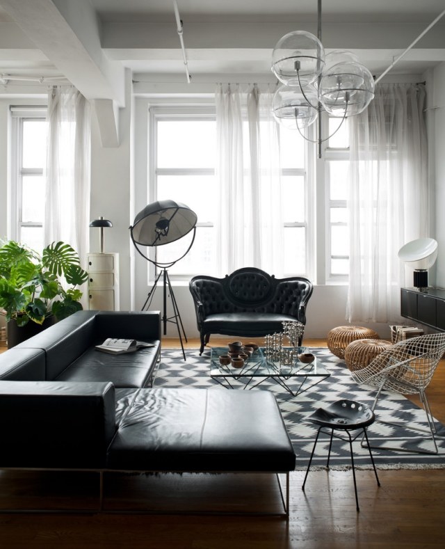 style-masculin-appartement-celibataire-canapé-cuir-tapis-noir-blanc-fauteuil-cuir-chaise-métal