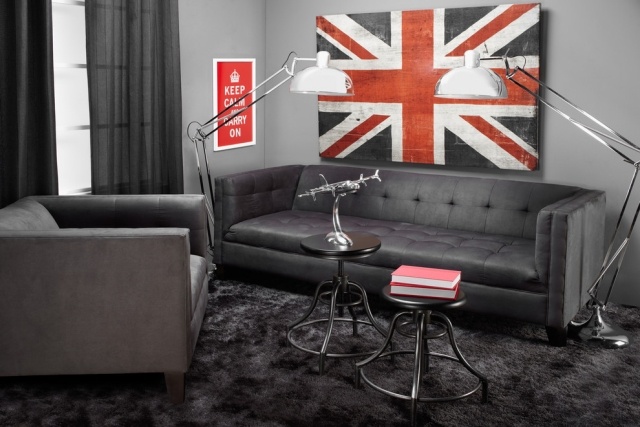 style-masculin-appartement-celibataire-canapé-tapis-gris-tableau-drapeau-américain style masculin
