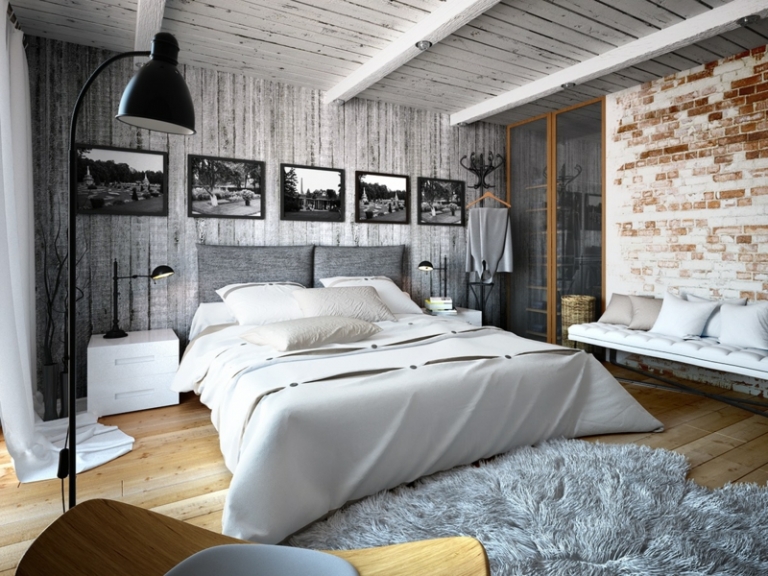 deco-loft-chamabre-coucher-mur-brique-bois-grisâtre-tapis-shaggy-gris-lampadaire-noir déco loft