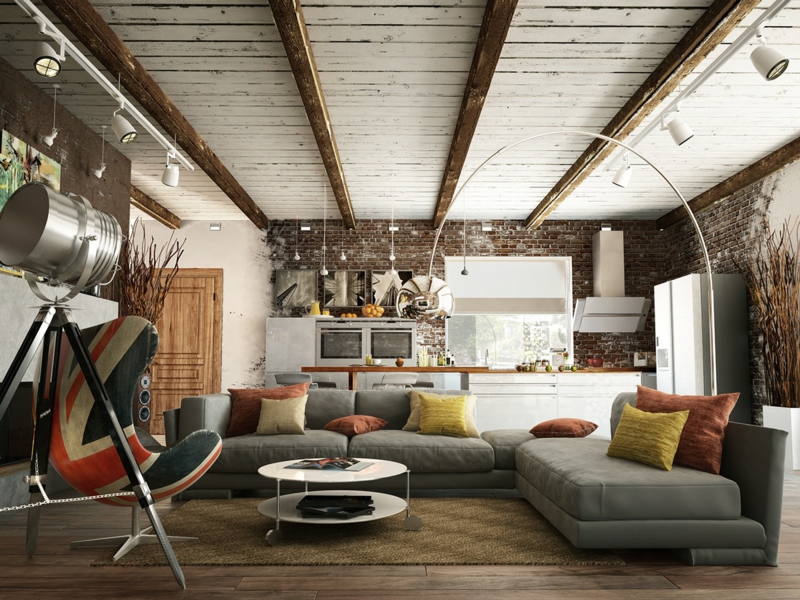 deco-loft-plafond-poutres-exposées-canapé-angle-gris-table-basse-blanche-fauteuil-cuir-drapeau-anglais déco loft