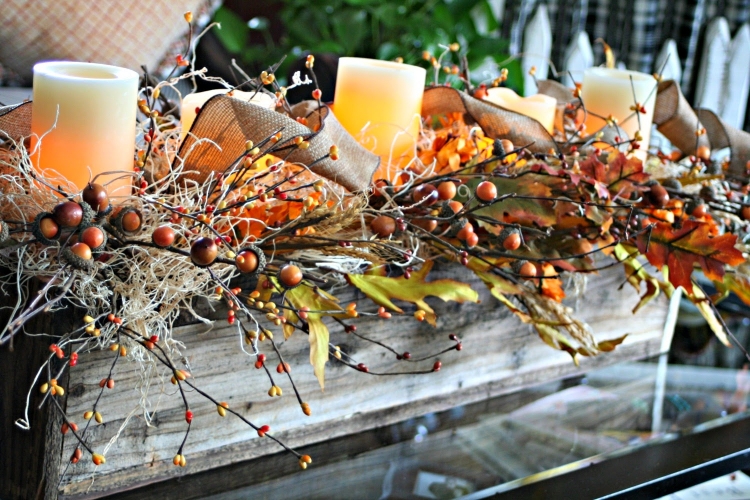 decoration-table-automne-arrangement-centre-table-brindilles-baies-noeuds-jute-bougies-cylindriques