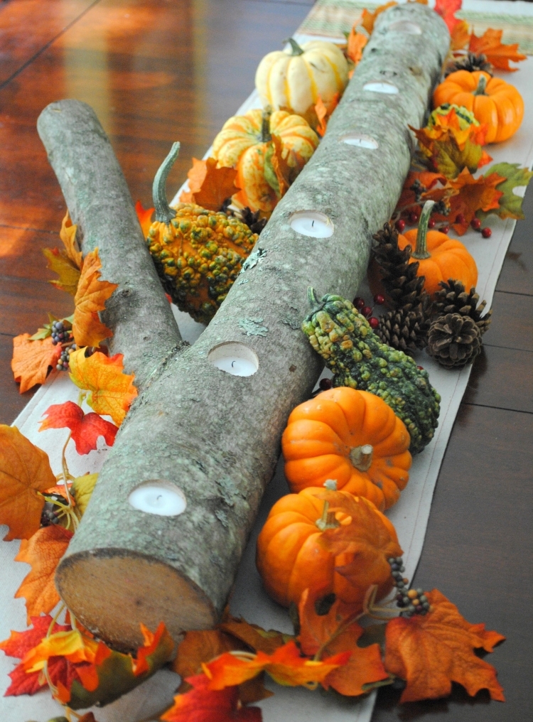 decoration-table-automne-porte-bougie-branche-citrouilles-décoratives-feuilels-automne-orange