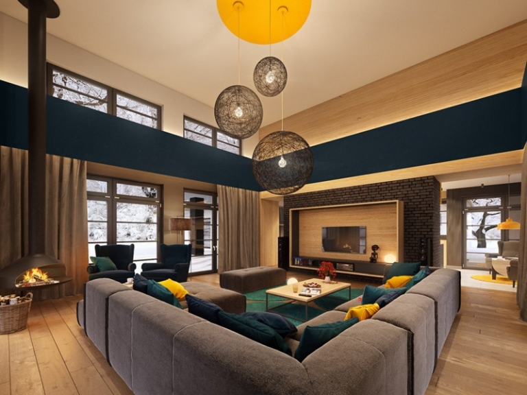 décoration-colorée-canapé-angle-gris-coussins-jaune-bleu-suspensions-boules-fils-mur-brique décoration colorée