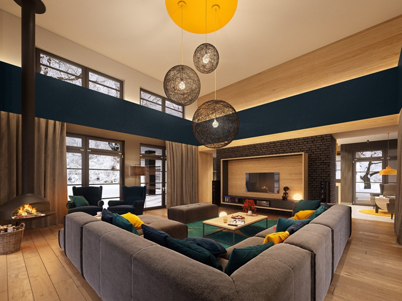 décoration-colorée-canapé-angle-gris-coussins-jaune-bleu-suspensions-boules-fils-mur-brique décoration colorée
