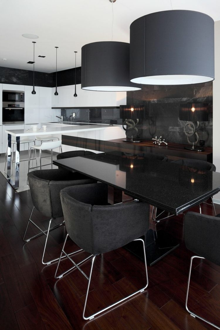 salle-manger-moderne-sombre-chaises-table-manger-noires-suspensions-noir-blanc salle à manger moderne