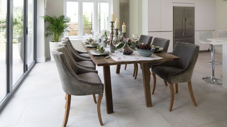salle-manger-moderne-sombre-chaises-tapisserie-grise-table-bois-massif salle à manger moderne
