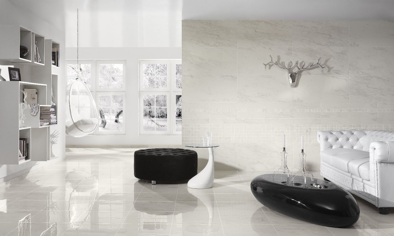 salon-moderne-blanc canapé Chesterfield blanc ottomane noire