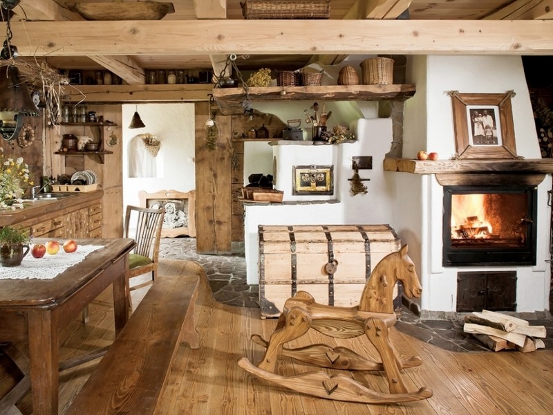 decoration-maison-campagne-cheminee-blanche-parquet-bois-table-bancs-bois