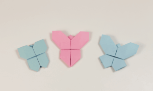 origami-animaux-papillons-papier-pastel-bleu-rose