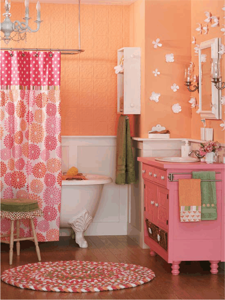 salle-bain-coloree-peinture-murale-orange-chaud-meuble-vasque-rose