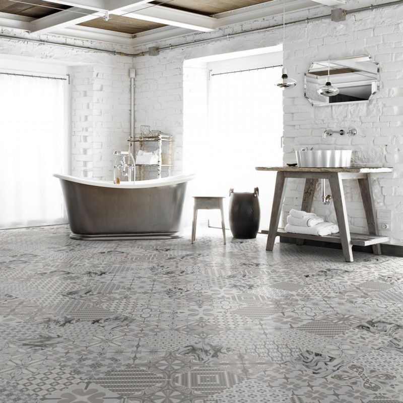 salle-bain-moderne-carrelage-sol-patchwork-gris-mur-brique-blanche salle de bain moderne