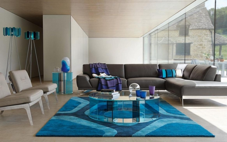 table-salon-design-ronde-plateau-base-verre-tapis-bleu