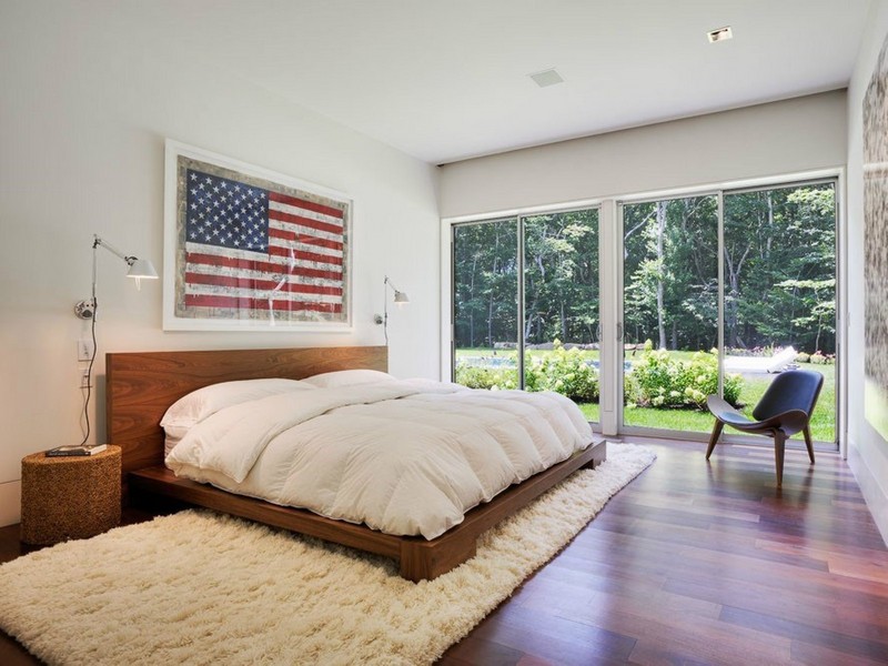 chambre-style-new-york-peinture-blanche-cadre-décoratif-lit-bois-massif