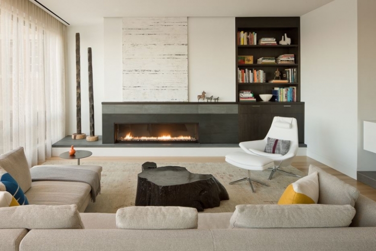 cheminée-bois-design-métal-gris-nuancé-meubles-design-blanc-gris