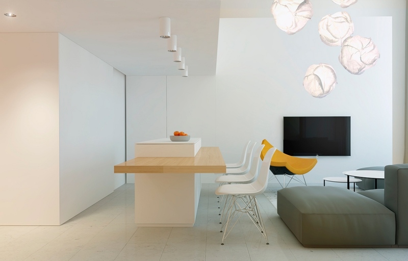 couleur-gris-appartement-cuisine-blanche-chaises-eames-bar-petit-dejeuner-bois