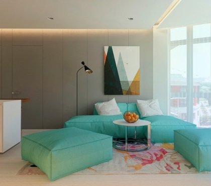 couleur-gris-appartement-salle-sejour-canape-ottomans-vert-menthe-tapis-bariole