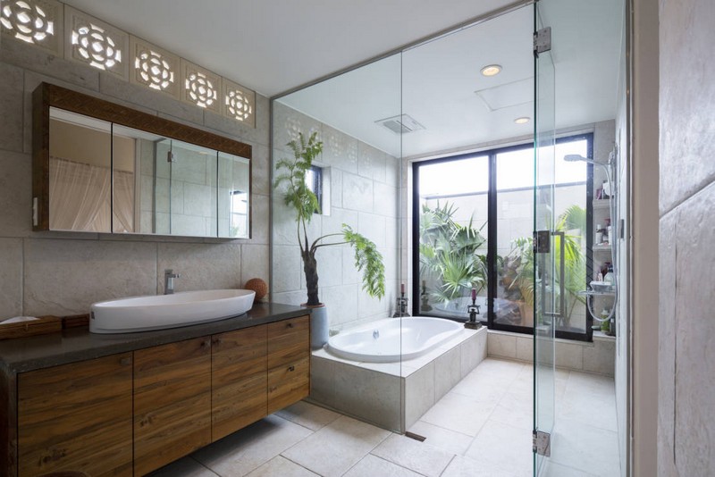 decoration-salle-bain-zen-plantes-vertes-baignoire-meuble-vasque-bois-eclairage-indirect