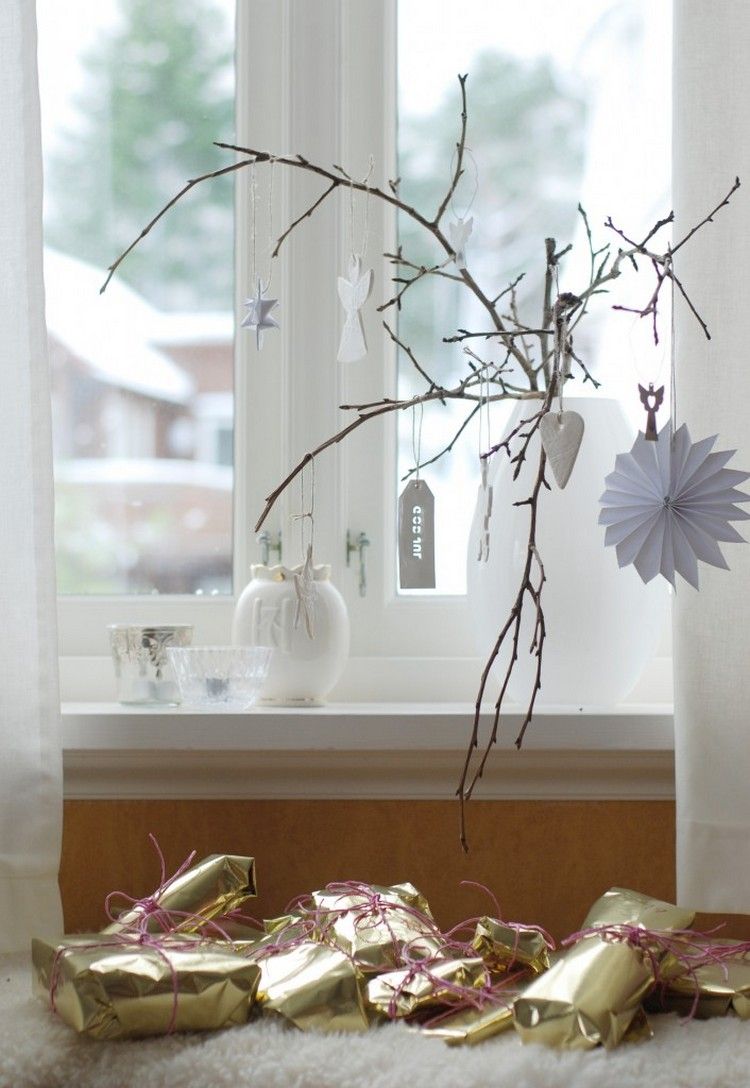 déco-Noël-faire-soi-même-rebord-fenêtre-branches-papier