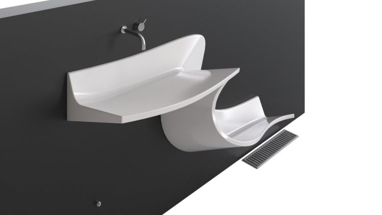 lavabo-design-innovant-forme-s-robinetterie-encastrée-siphon-sol