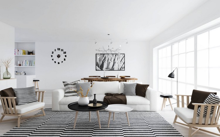 canapé scandinave -blanc-design-elegant-cousisns-rayures-tapis-raye-noir-blanc