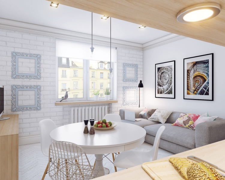 design-scandinave-murs-blanc-canapé-gris-taupe-table-ronde-bois-blanc