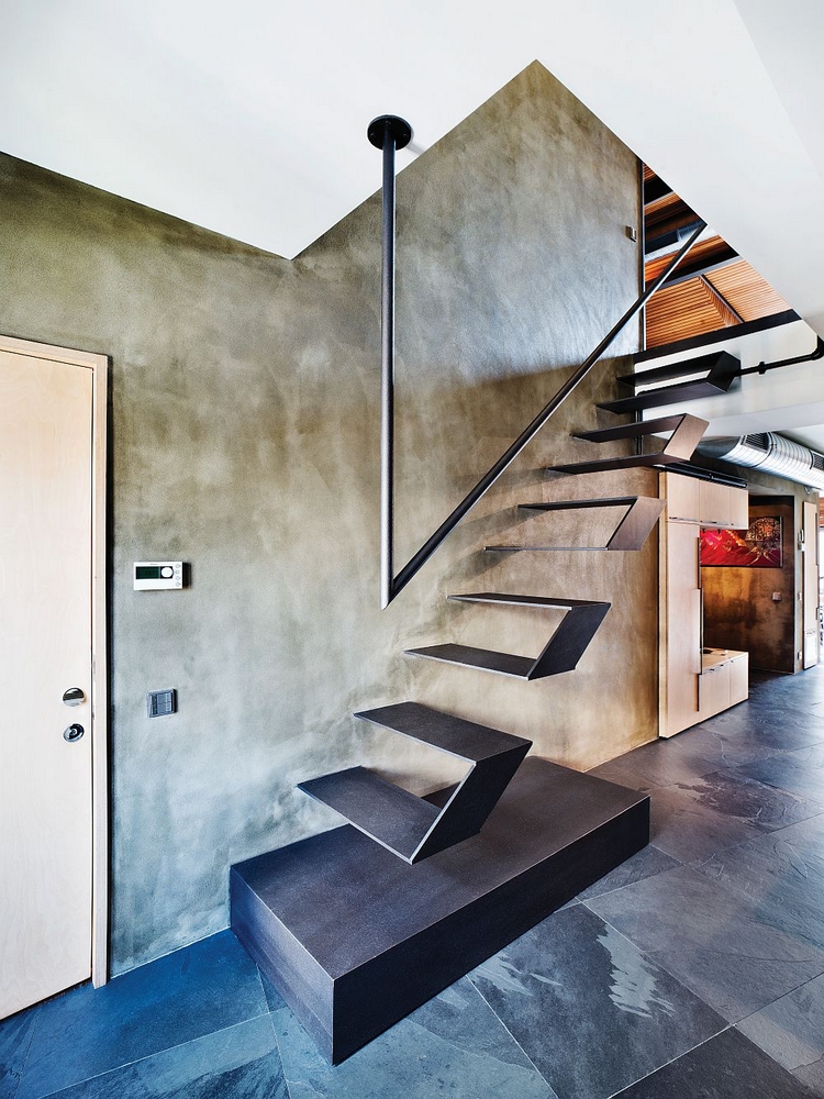 déco-style-industriel-murs-béton-escalier-suspendu-départ-main-courante-acier