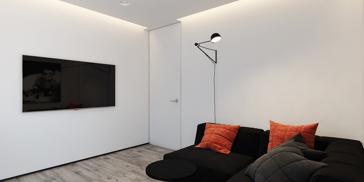 décoration-noir-blanc-applique-articulée-coussins-orange-chambre-amis