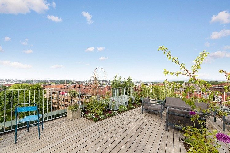 jardin sur le toit –terrasse-parterres-fleurs-mobilier-confortable