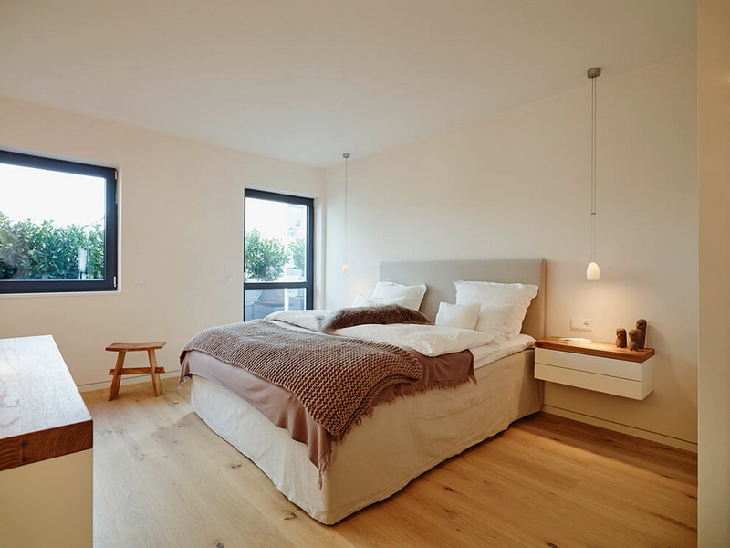 meubles blanc et bois clair plancher chambre adulte penthouse design